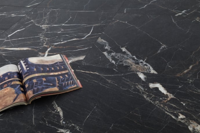 Matt black marble with golden and white veins