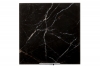 Glossy black marble with golden and white veins